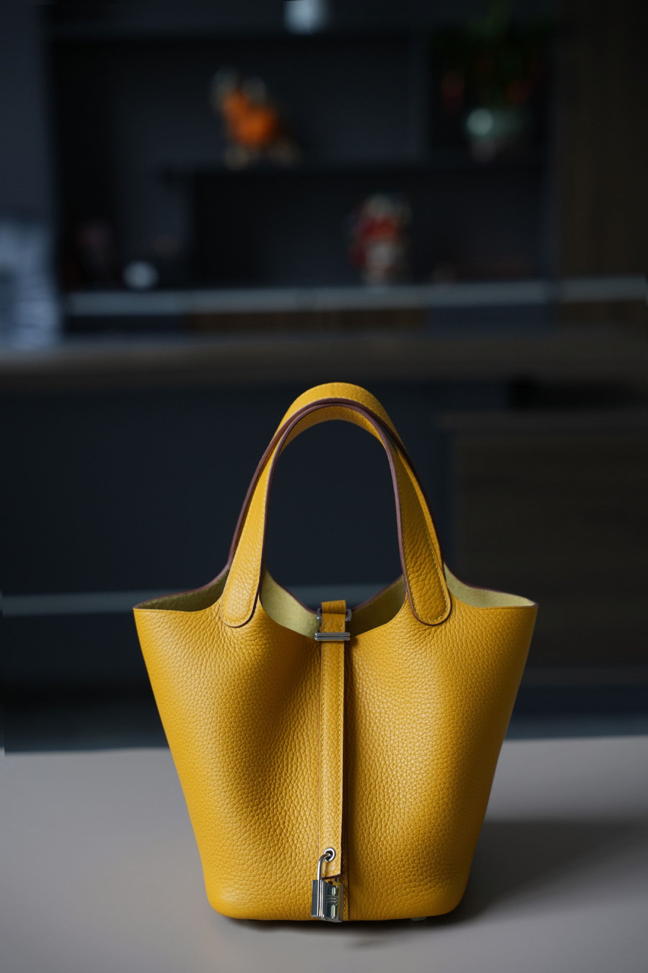 amber yellow silver buckle fanlosn leather bucket bag,women,front