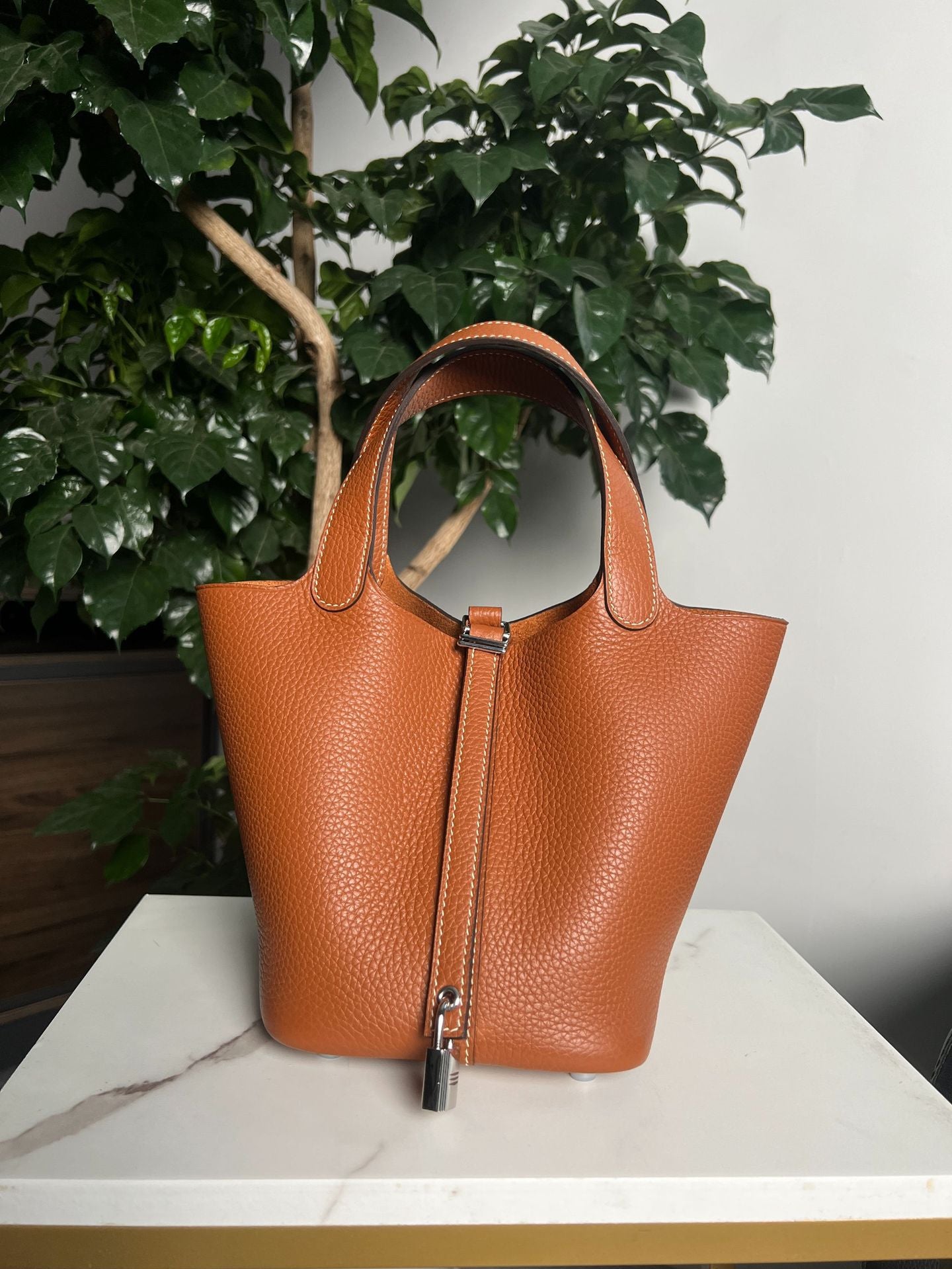 golden brown with silver buckle fanlosn leather bucket bag,women,front