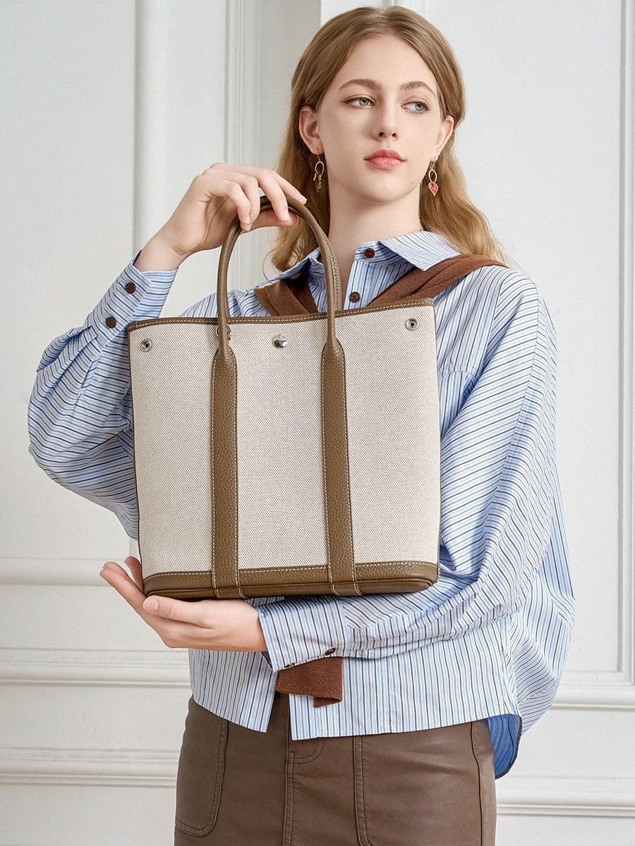 khaki canvas stitching leather small handbag,ladies,model display