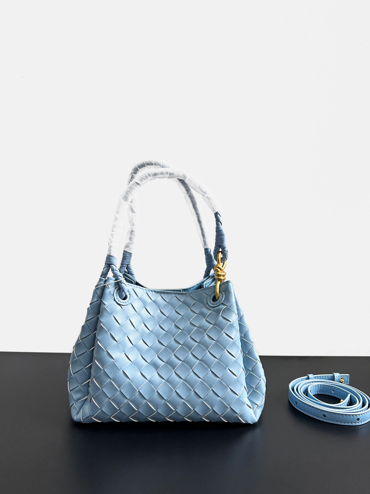 glacier blue leather woven parachute handbag,women,front